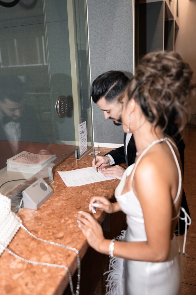 Bride and groom applying for their Las Vegas marriage license