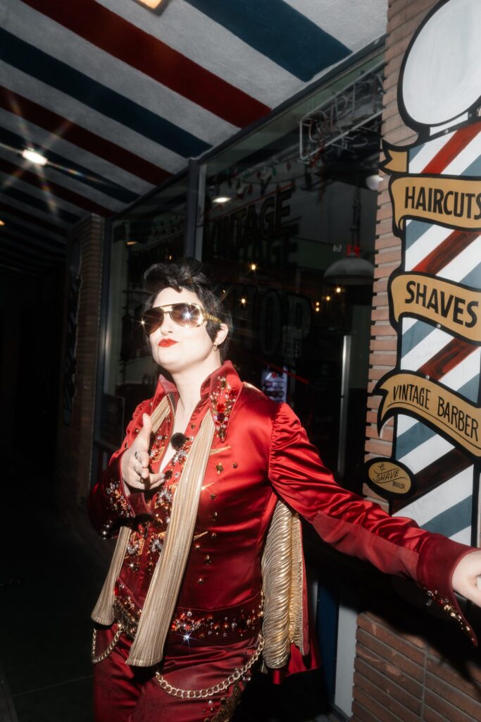 Lady Elvis standing outside of Sure Thing Chapel in Las Vegas.
