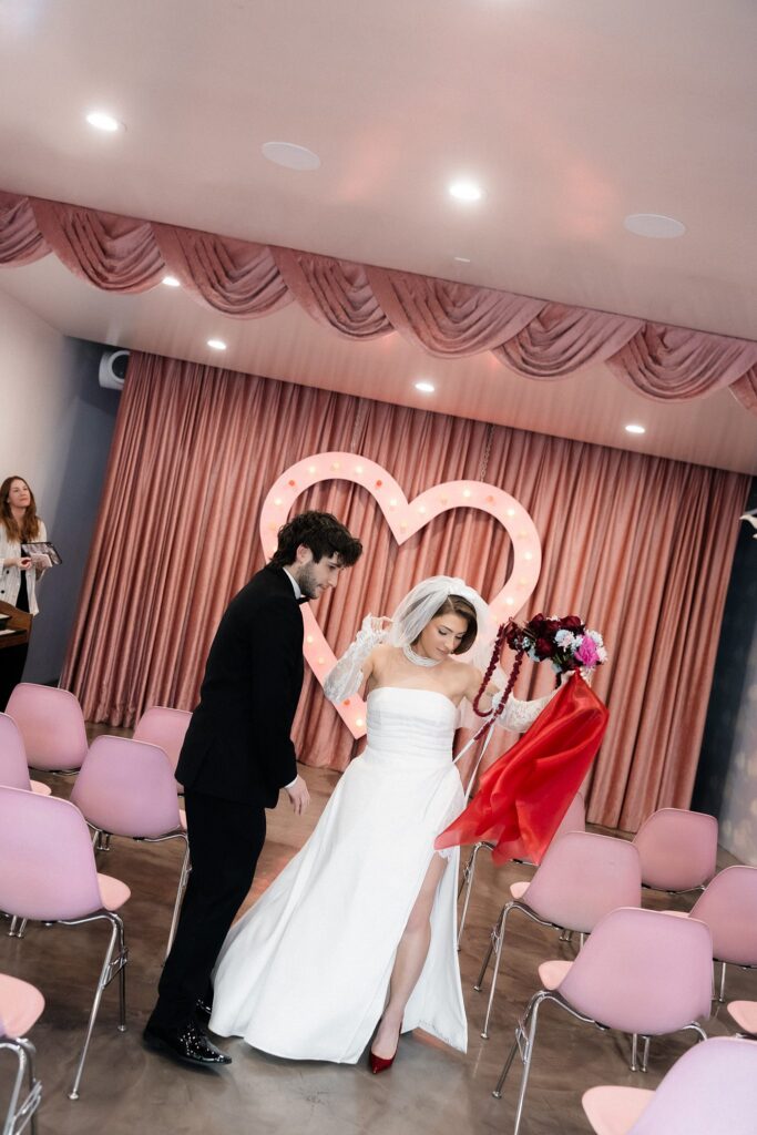 Bride and groom walking back down the aisle at Sure Thing Too in Las Vegas.