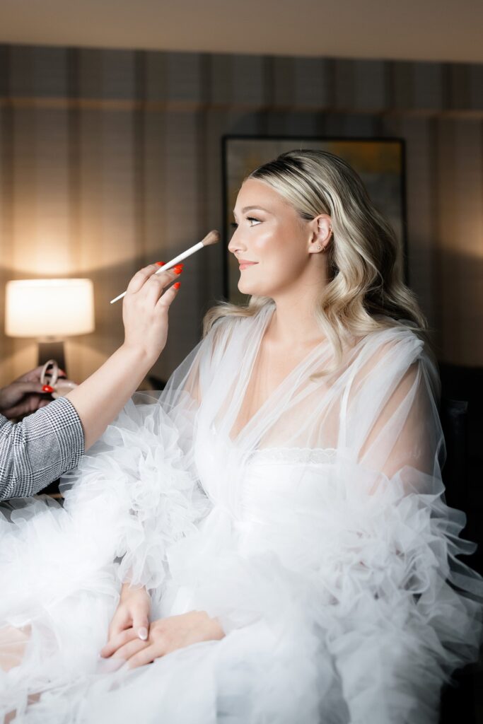 Bride getting her hair and makeup done for her Las Vegas elopement