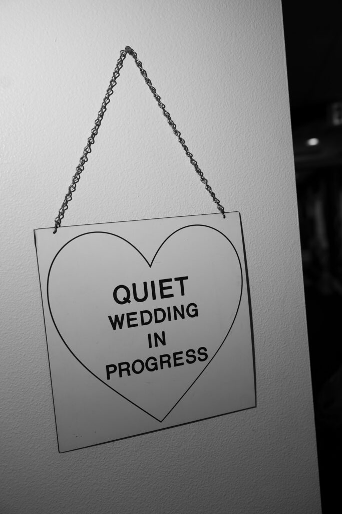 Quiet wedding in progress sign