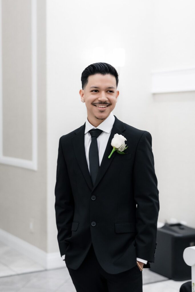 Groom watching his bride walk down the aisle for their Bliss Wedding Chapel Las Vegas elopement