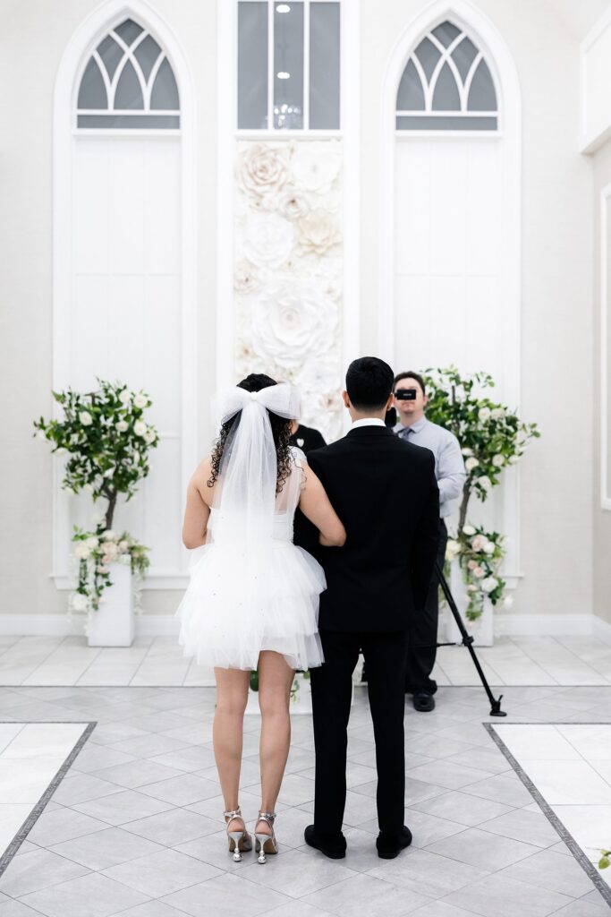 Bride and groom standing at the altar during their Bliss Wedding Chapel Las Vegas elopement