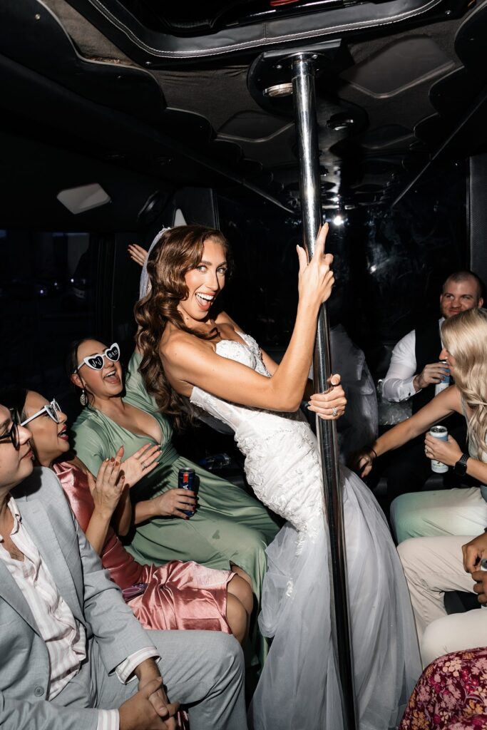 Bride dancing on the party bus