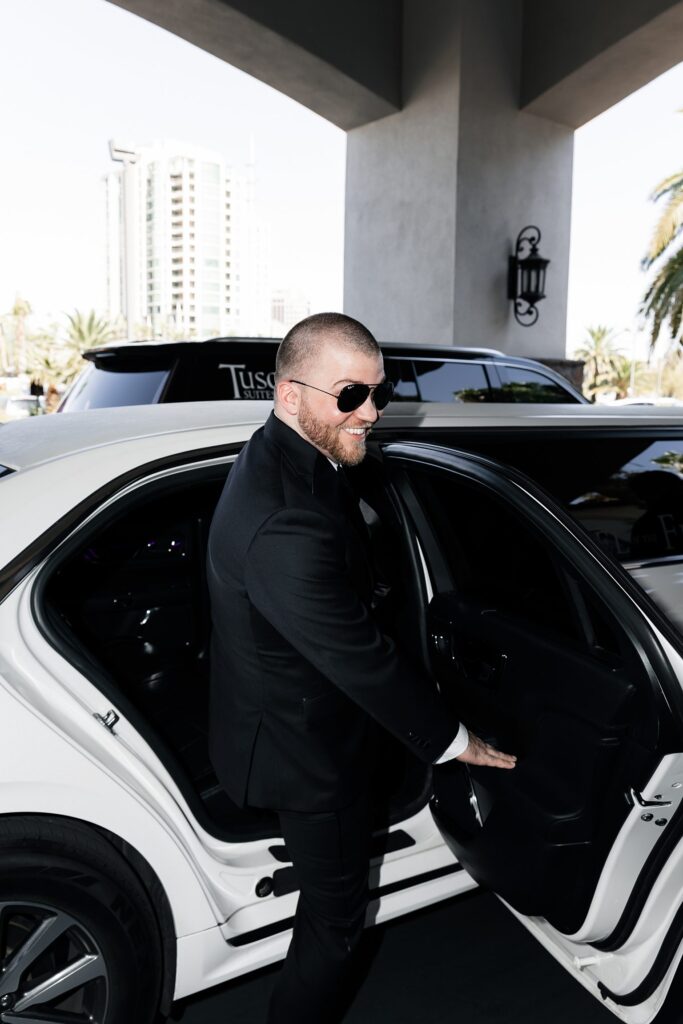 Groom getting into a limo