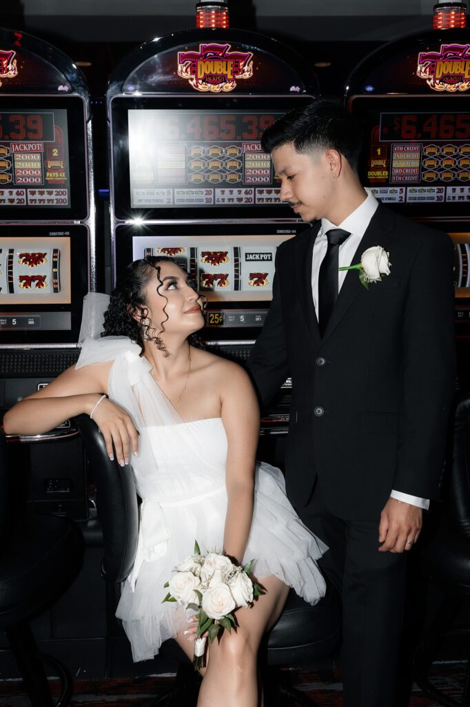 Bride and grooms Las Vegas casino portraits on Fremont Street