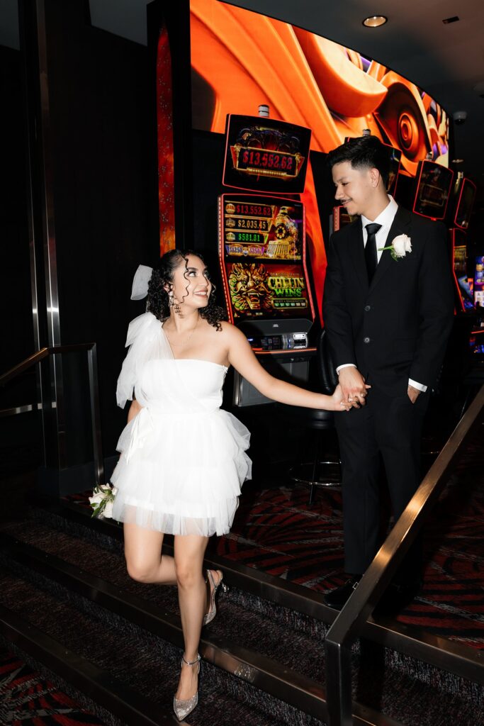 Bride and grooms Las Vegas casino portraits on Fremont Street