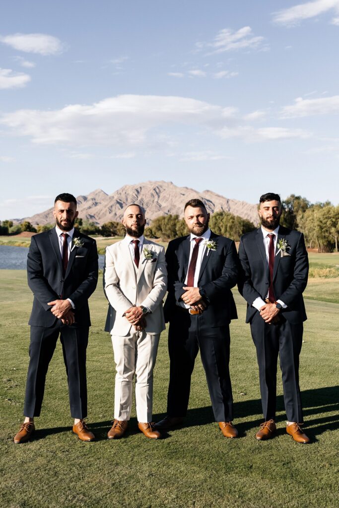 Outdoor groom and groomsmen's portraits from a Stallion Mountain wedding in Las Vegas