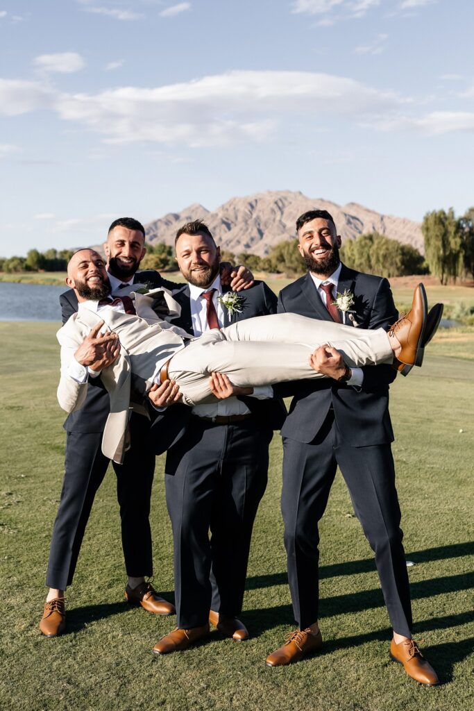 Outdoor groom and groomsmen's portraits from a Stallion Mountain wedding in Las Vegas