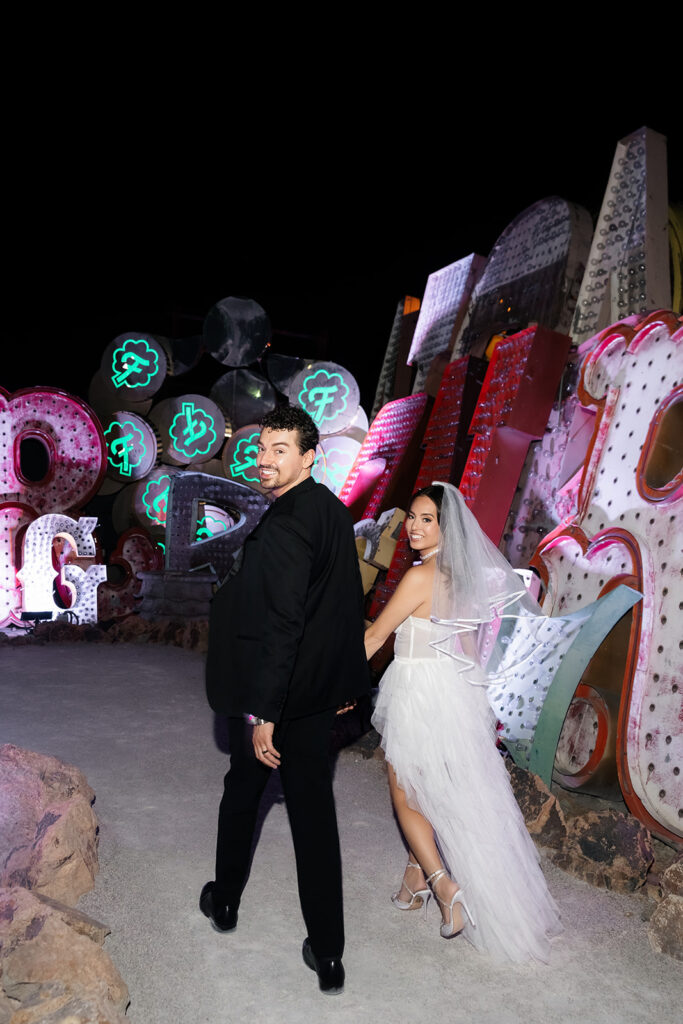 Nighttime Neon Museum Las Vegas wedding photos.