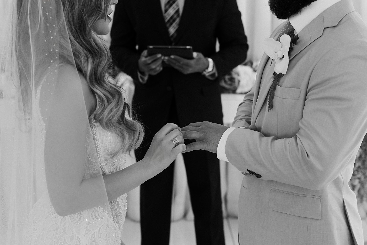 Couple holding hands during their Las Vegas elopement ceremony