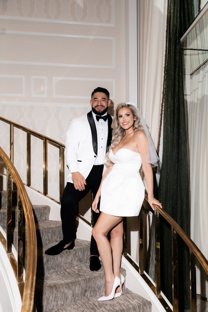 Bride and groom posing at The Golden Nugget for their Las Vegas hotel elopement