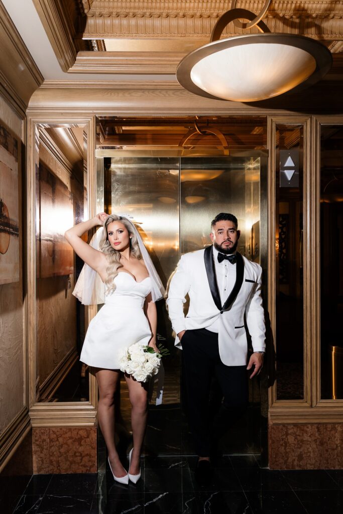 Bride and groom posing at The Golden Nugget for their Las Vegas hotel elopement