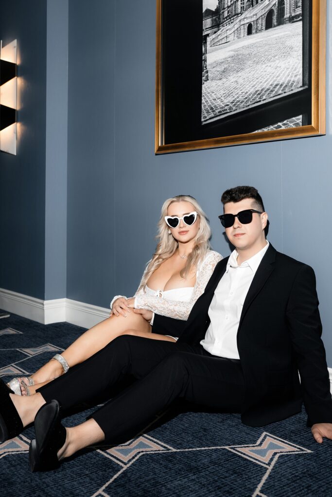 Couple posing in the hallways at Fontainebleau