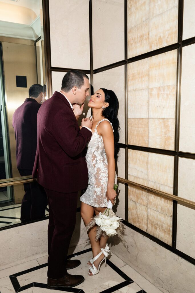 Bride and groom in the elevator at Caesars Palace