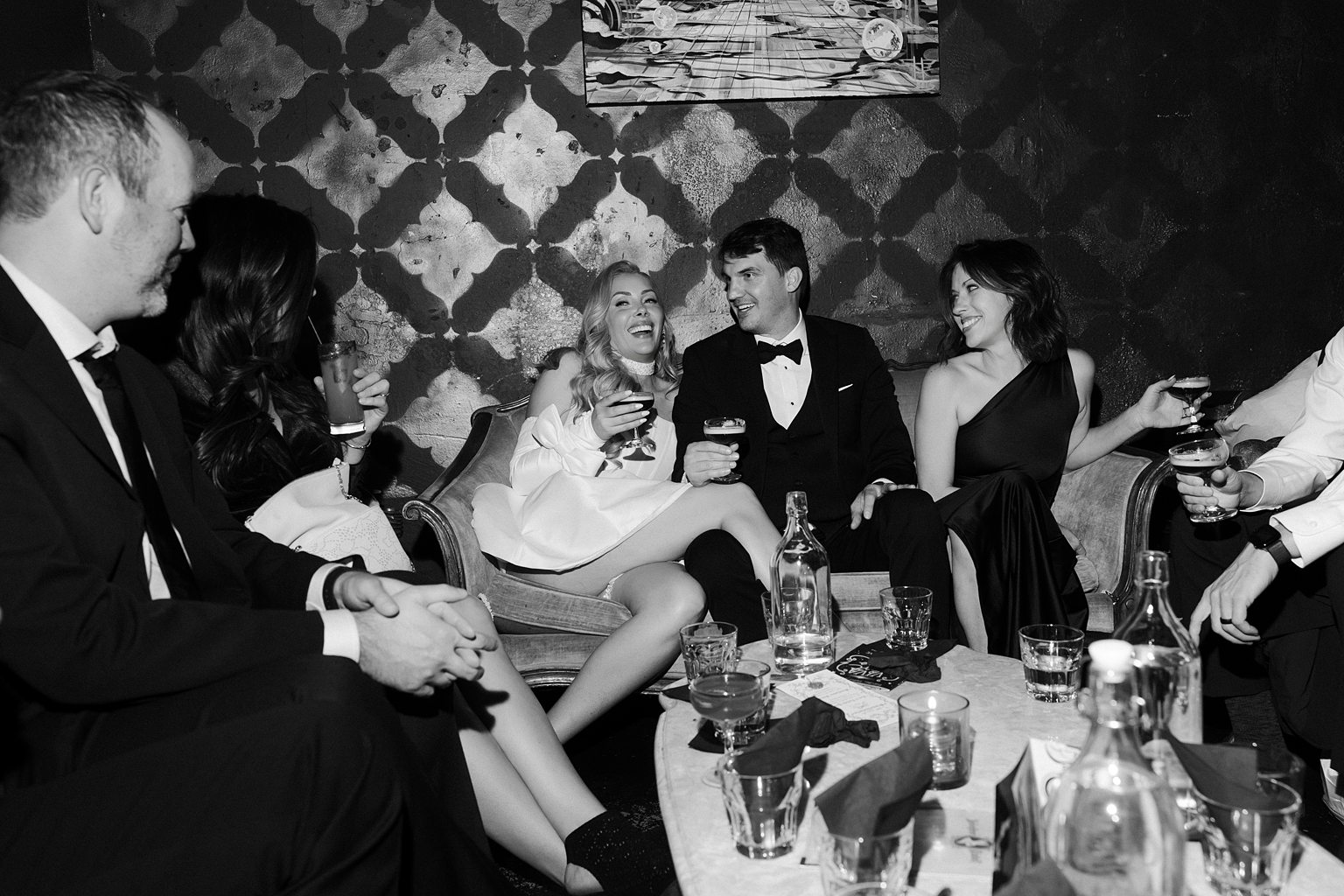 Bride and groom enjoying drinks at Velveteen Rabbit