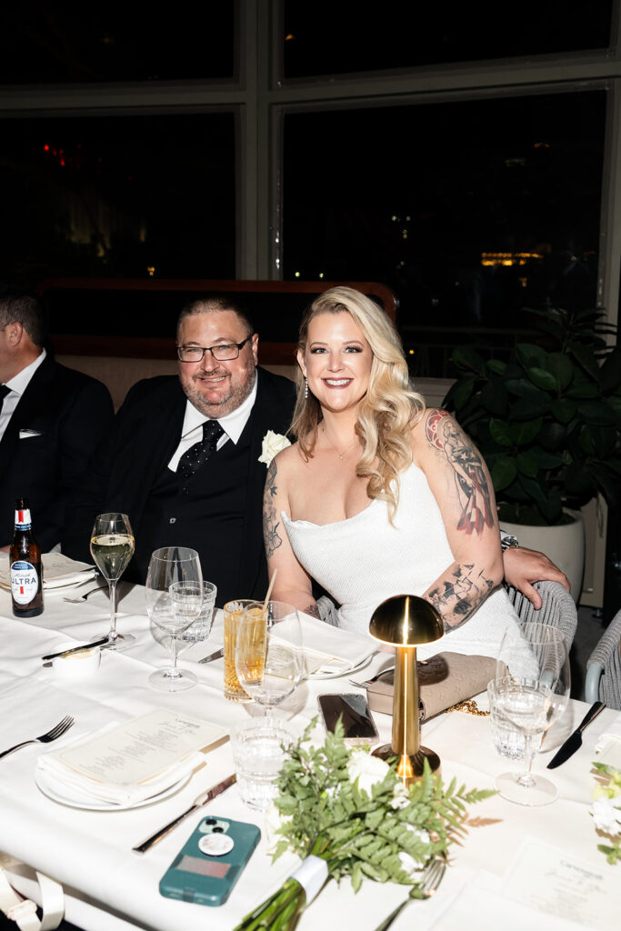Bride and groom enjoying an intimate Las Vegas post-wedding dinner at Carver Steakhouse