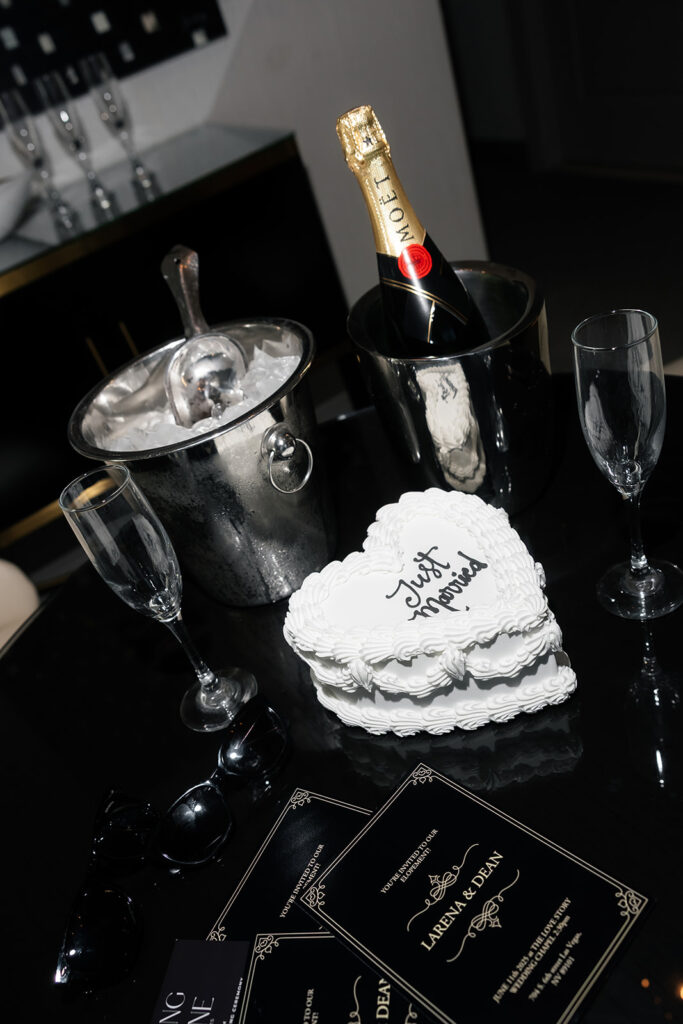 Just married cake and champagne from an intimate Las Vegas elopement reception at The Cosmopolitan Terrace Suite
