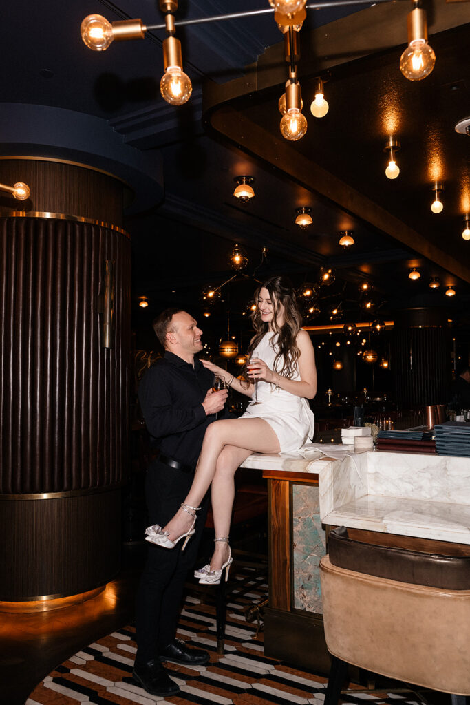 Couple posing for their engagement photos at Berry's Prime in Las Vegas