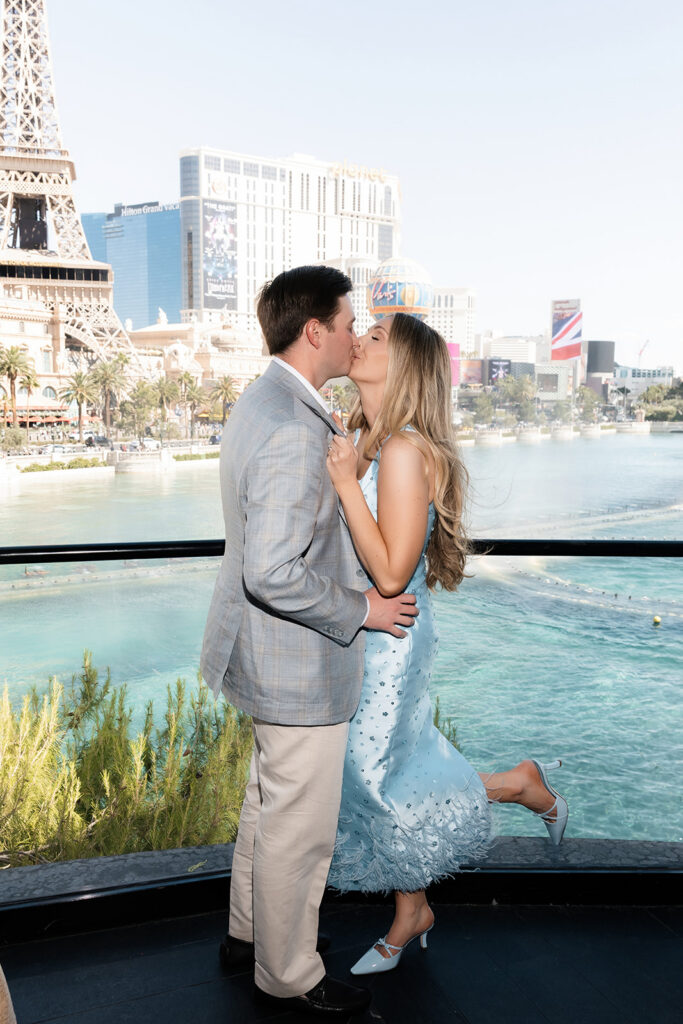 Bride and groom kissing during Spago Las Vegas micro wedding reception.