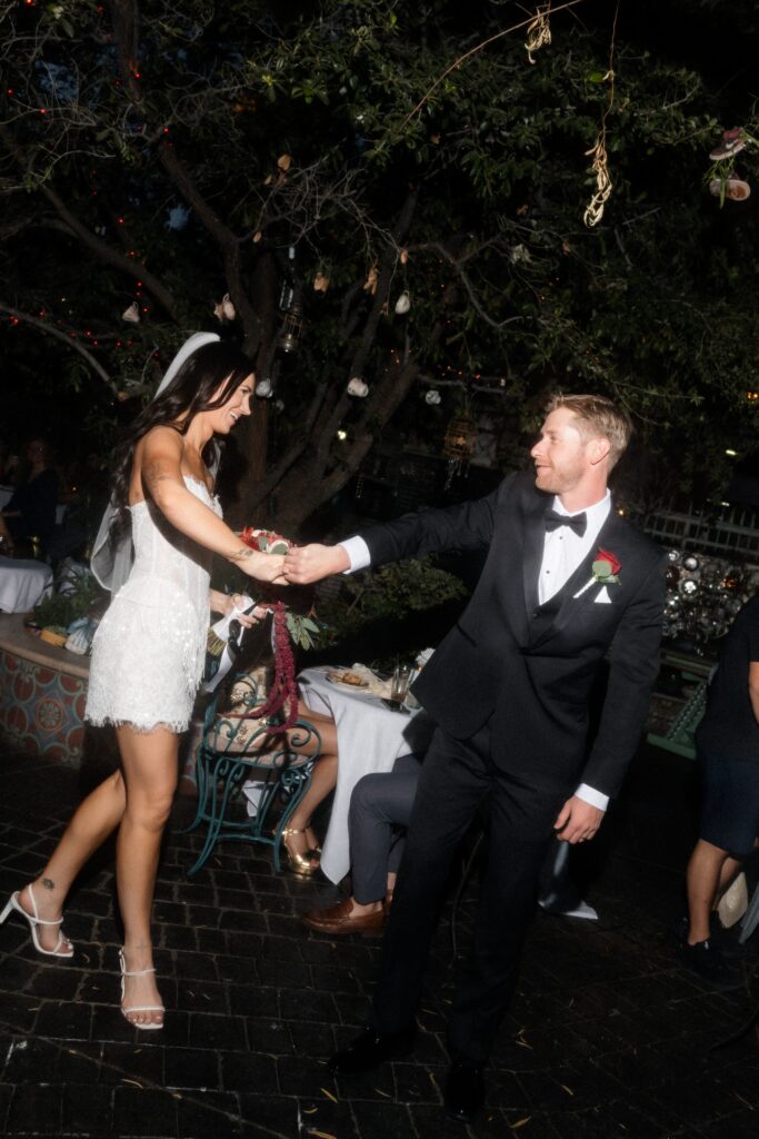 Bride and groom dancing during their Las Vegas micro wedding reception at The Park on Fremont.