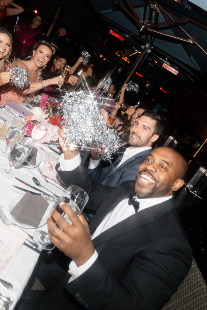 Guests eating dinner during a Las Vegas wedding reception at Ocean Prime.
