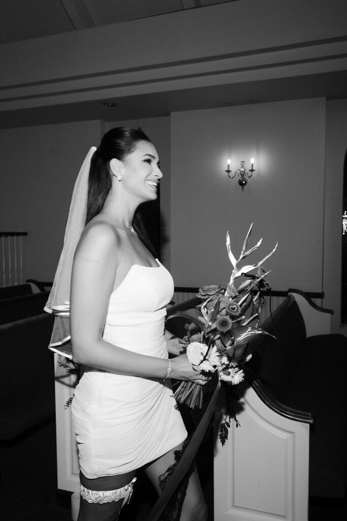 April Love Geary walking down the aisle at A Special Memory Wedding Chapel