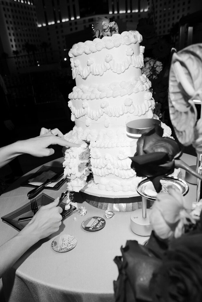 Close-up of a textured white wedding cake during a reception in Vegas at the Cosmopolitan.