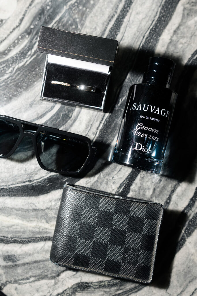 Las Vegas groom elopement details laid out on a table.