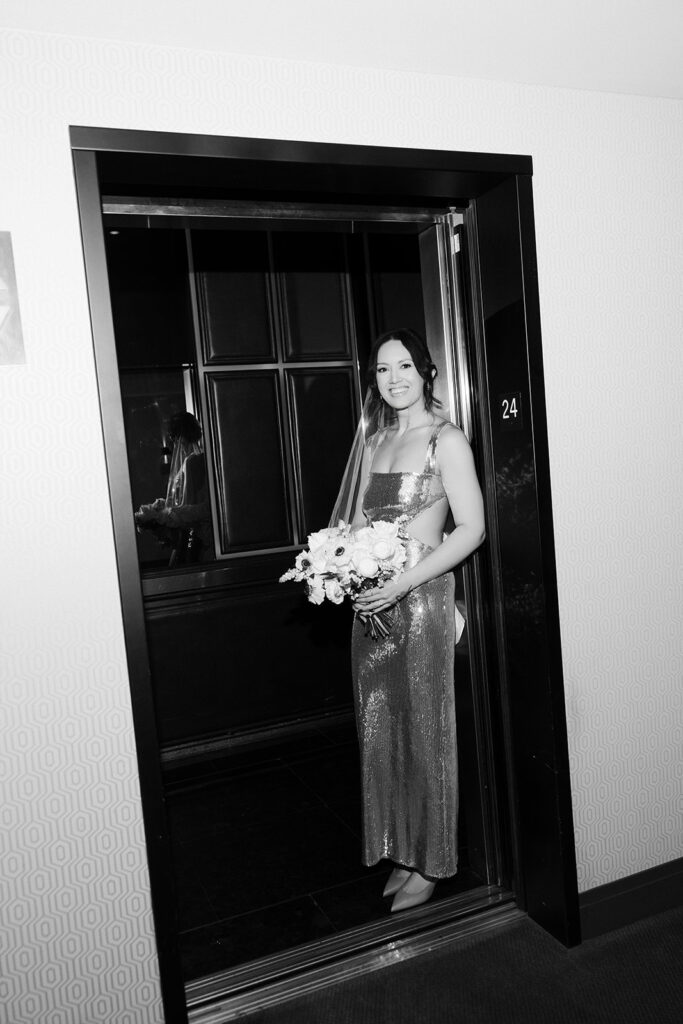Bride standing in elevator at The Cosmopolitan Las Vegas.