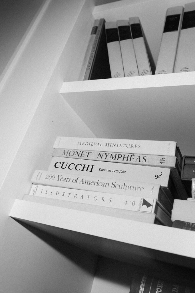 Vintage book and décor details inside the NoMad Library at Park MGM for a micro wedding reception.