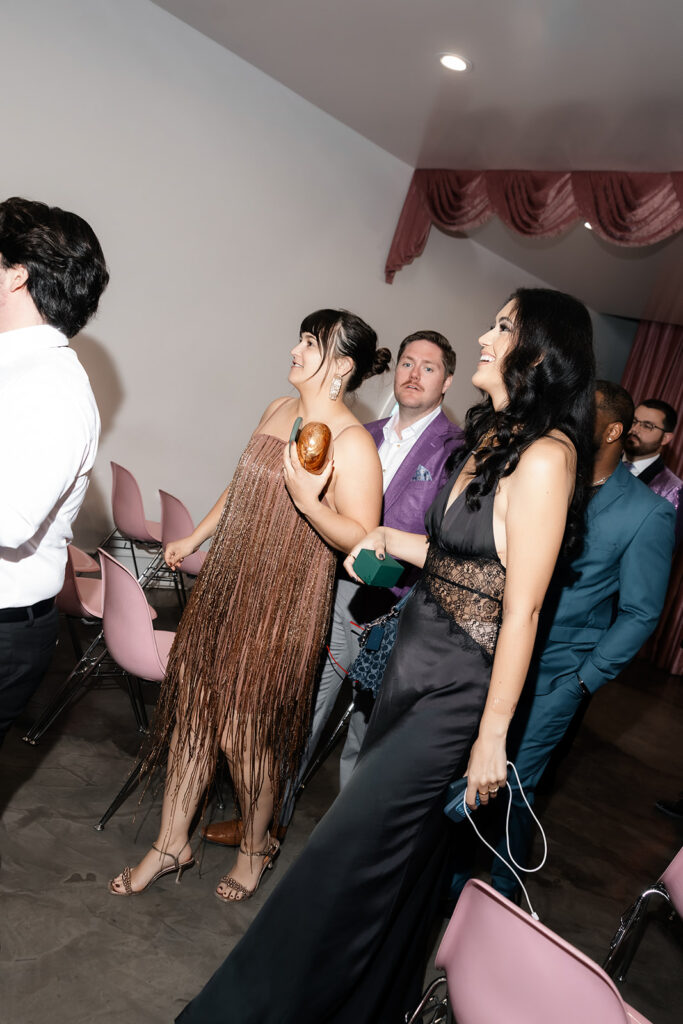 Guests laughing after a Sure Thing Chapel ceremony.