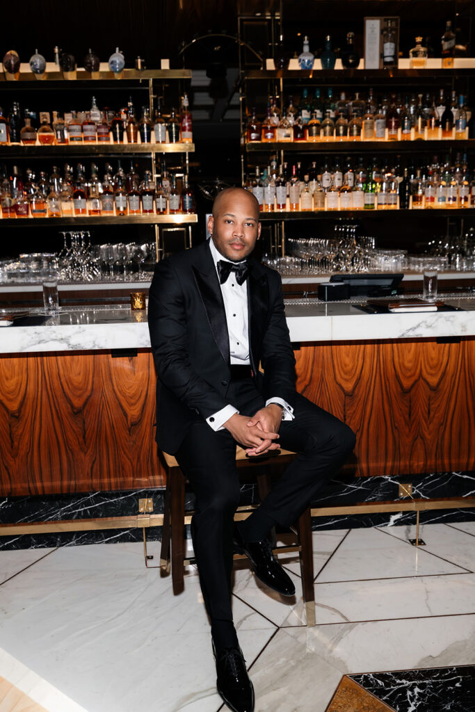 Editorial indoor grooms portraits from a Wynn Las Vegas wedding.