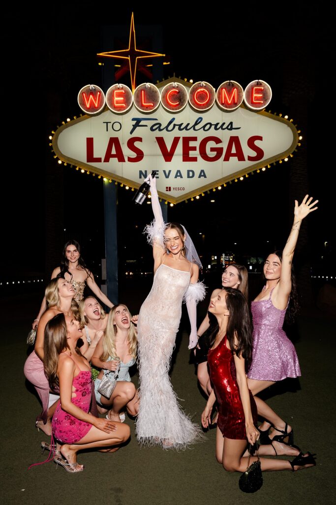 Bride and her friends with champagne for her Las Vegas bachelorette party. 