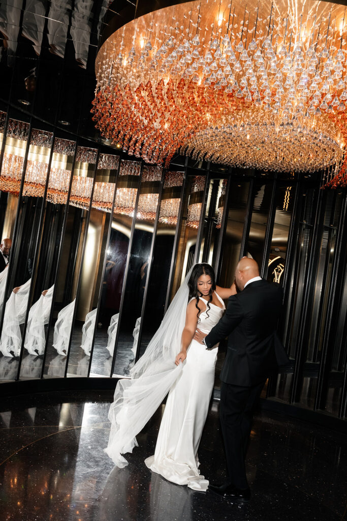 Flash photo of  a bride and groom dancing for their Wynn Las Vegas wedding photos. 