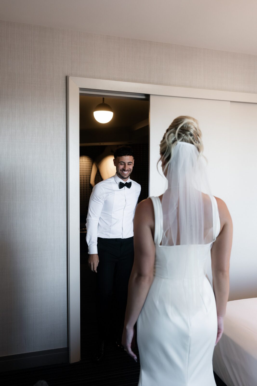 Bride and groom sharing a first look during their luxury elopement in Las Vegas.