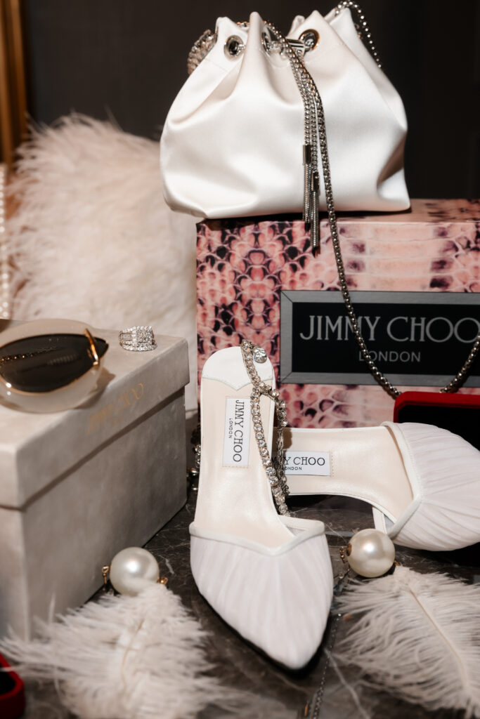 Luxury elopement details with Jimmy Choo shoes.