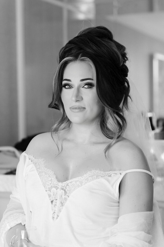 Bride portrait in a lace wedding robe during a luxury elopement at Wynn Las Vegas.
