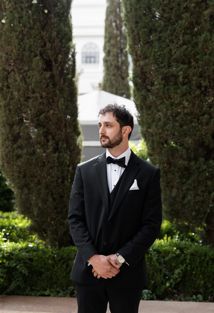 Outdoor grooms portraits in the gardens at Caesars Palace in Las Vegas.