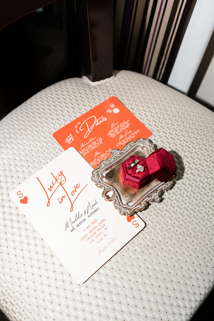 Wedding details sitting on a chair.