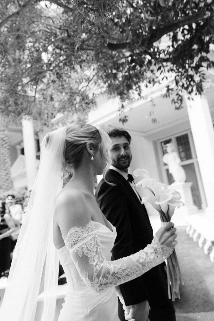 Newly married bride and groom walking down the aisle after their ceremony at the Venus Garden Chapel at Caesars Palace.