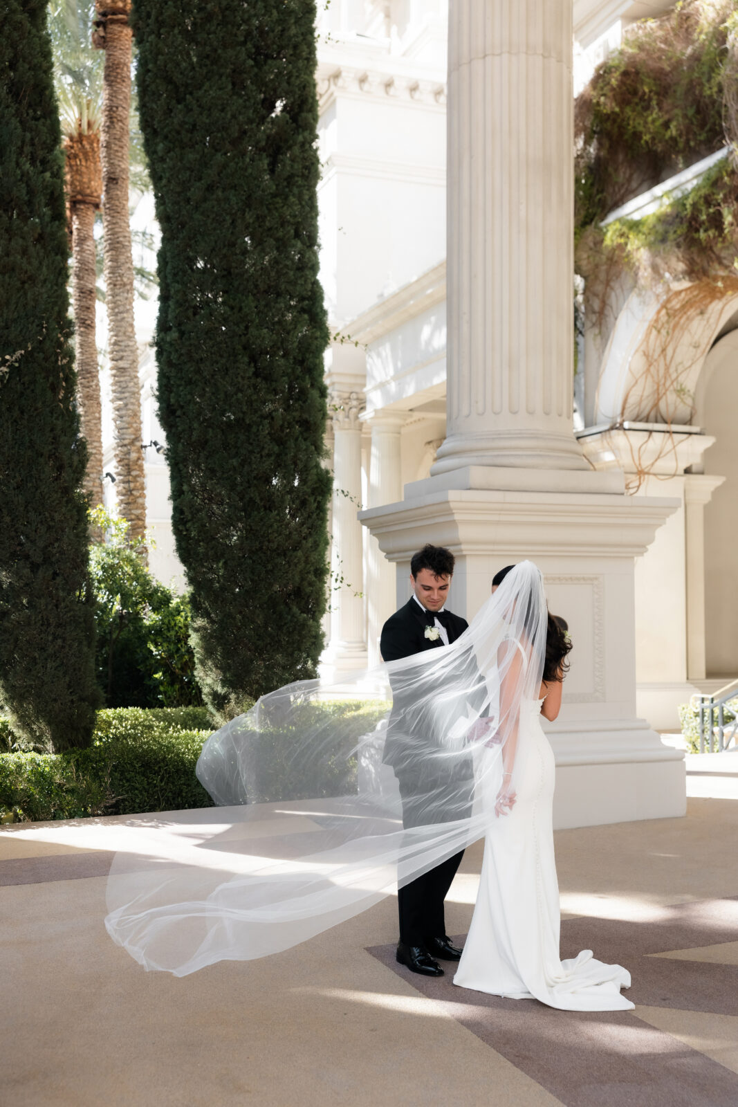 Outdoor bride and groom portrait at Caesars Palace in Las Vegas.