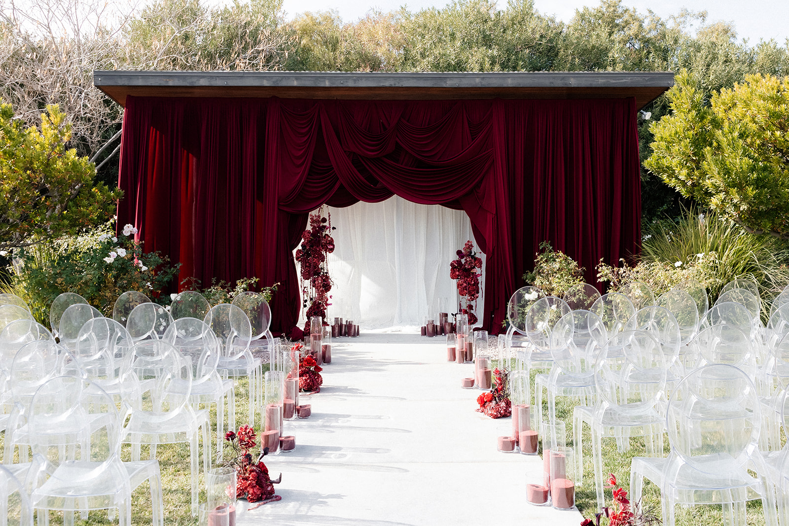 A moody and romantic outdoor wedding ceremony at The Pergola at The Lotus House in Las Vegas.