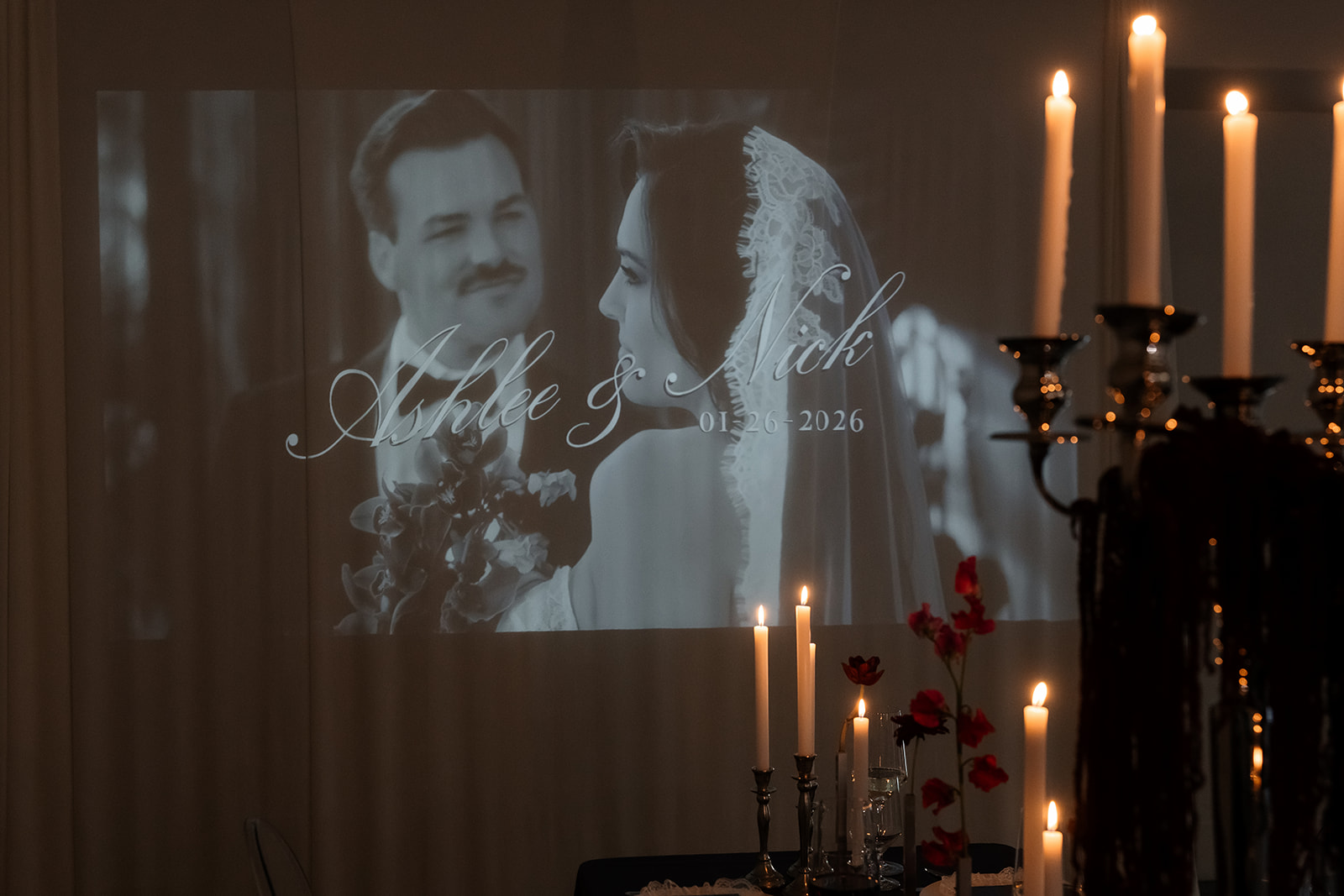 Wide shot of a custom wedding reception projection. 