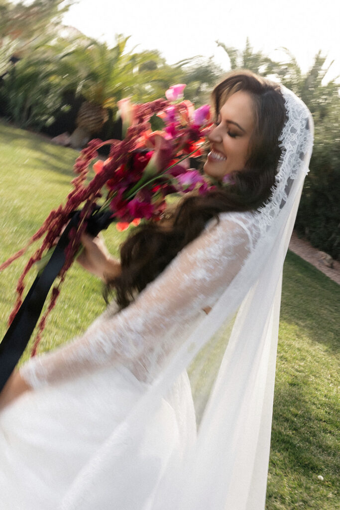 Motion blur portrait of a bride on the lawn at The Lotus House in Las Vegas.
