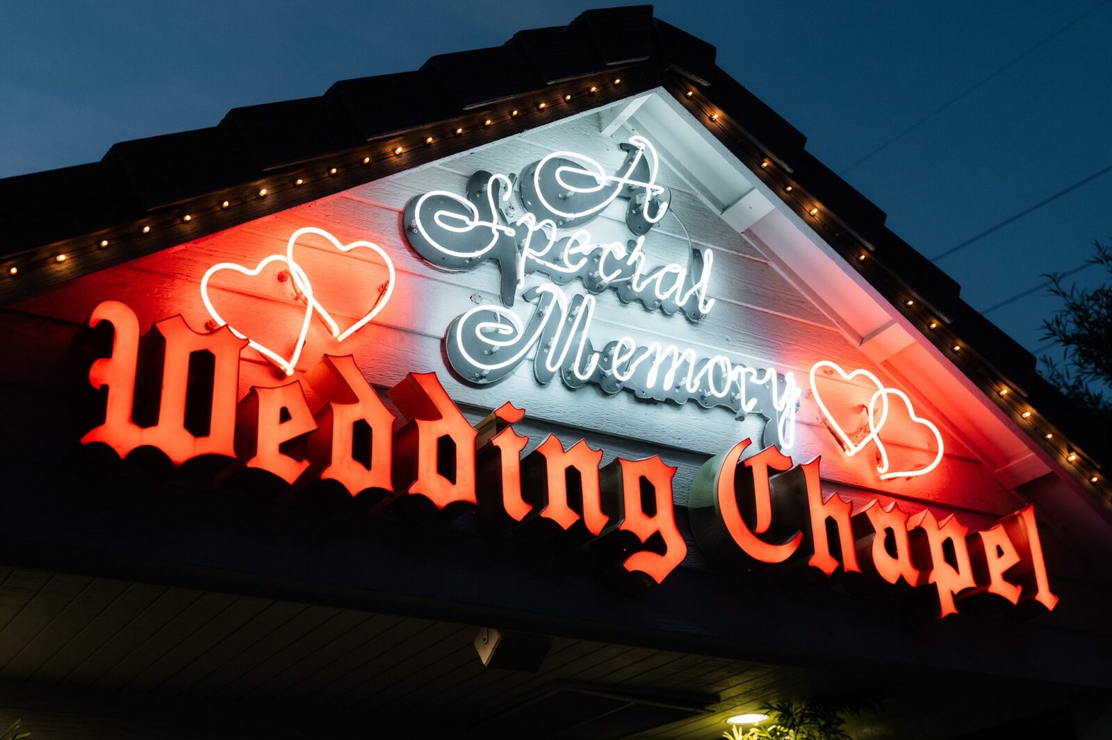 Close up shot of the exterior neon sign that says A Special Memory Wedding Chapel.