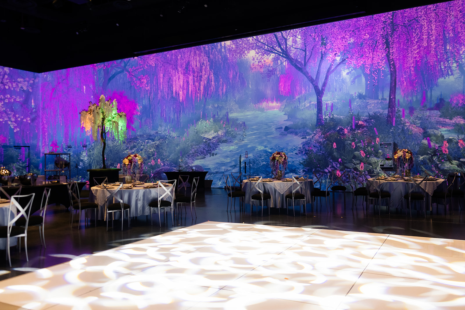 Wide shot of a Taylor Swift enchanted wedding reception at Area15.