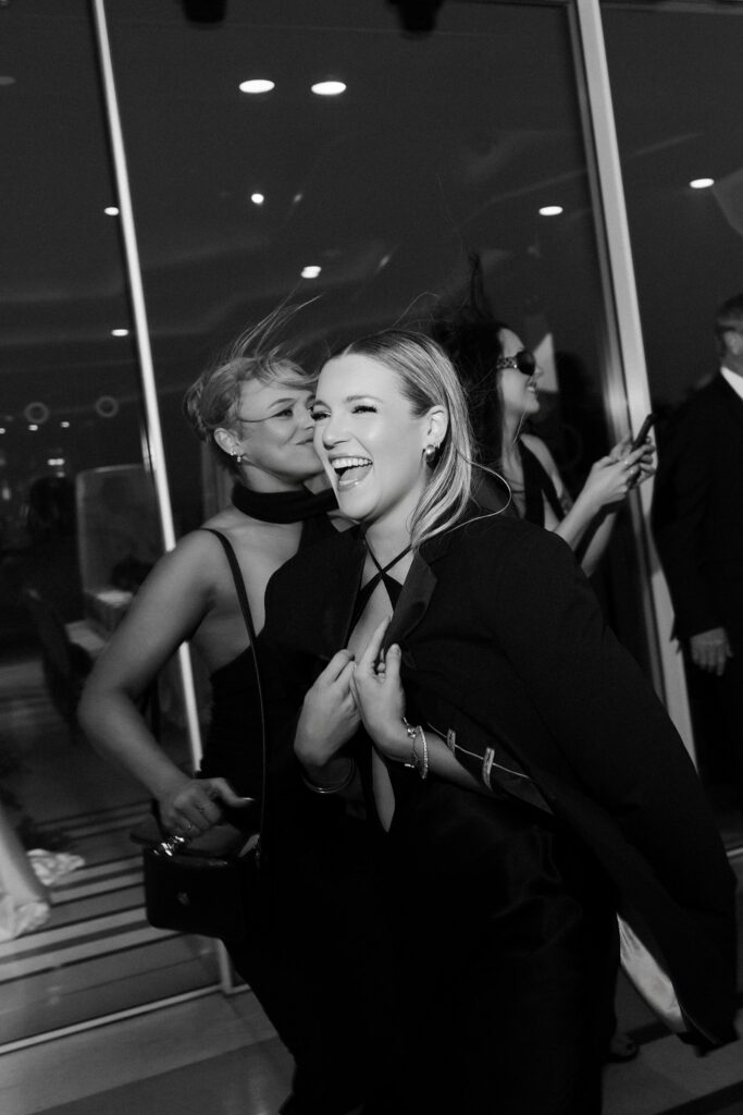 Black and white photo of guests up on the rooftop at Ghostbar at The Palms.