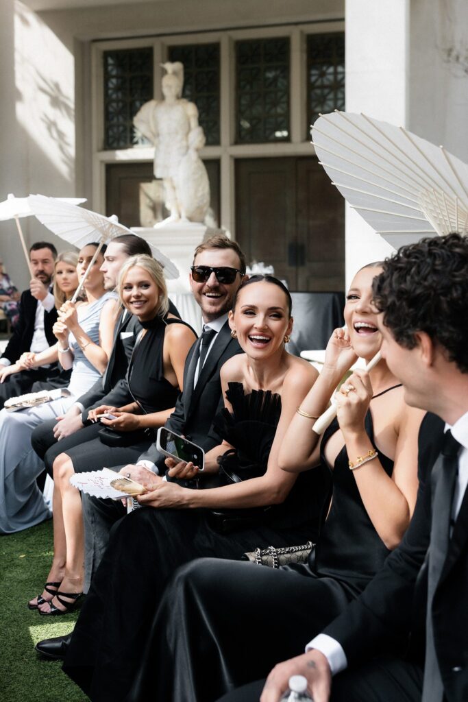 Guests mingling as they wait for a Venus Garden Caesars Palace wedding ceremony.