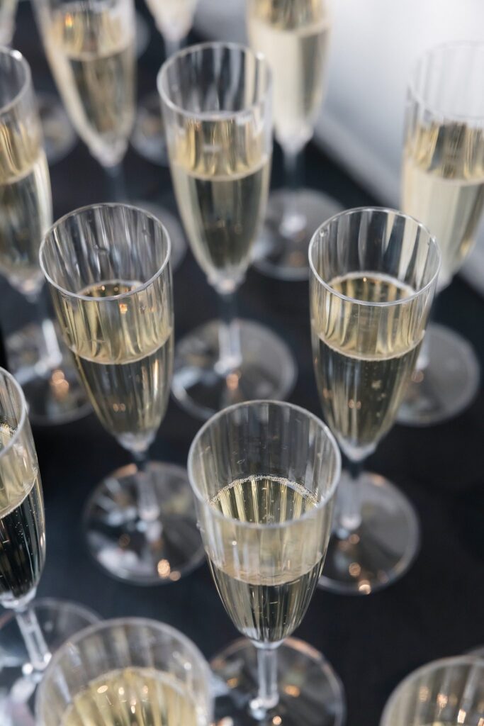 Glasses of champagne laid out for guests. 